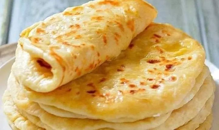 Nigerian pancakes, thin savoury sweet pancakes made with onion and pepper in the batter