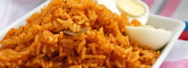 West African Jollof Rice in a pot, the classic tomato and pepper rice dish beloved across Nigeria, Ghana, and Senegal