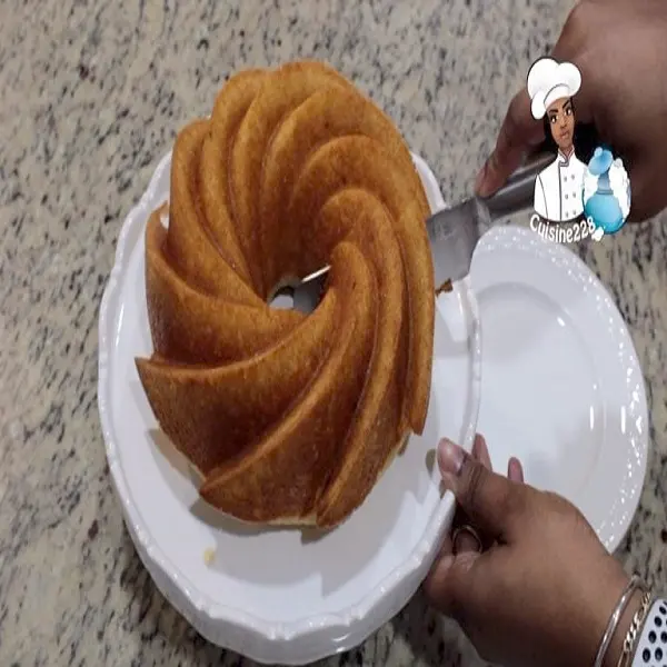South African Rum Cake on a serving plate with a rich rum butter glaze, a moist celebration cake