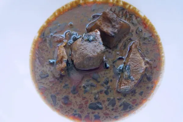 Abak Atama Soup served in a pot with assorted meat and fish, a traditional Ibibio palm nut soup from Akwa Ibom State, Nigeria