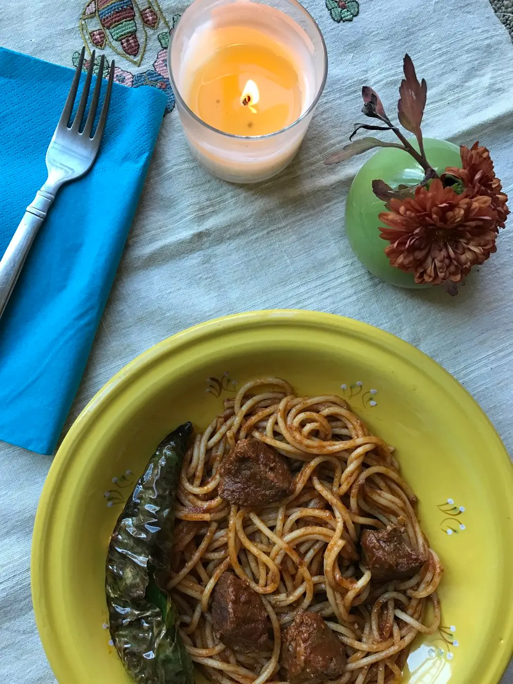 Tunisian Makrouna spiced pasta with lamb, harissa, and tomato sauce, a bold North African pasta dish
