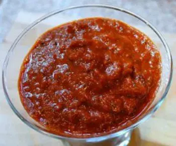 African pepper sauce, a thick blended habanero and bell pepper condiment
