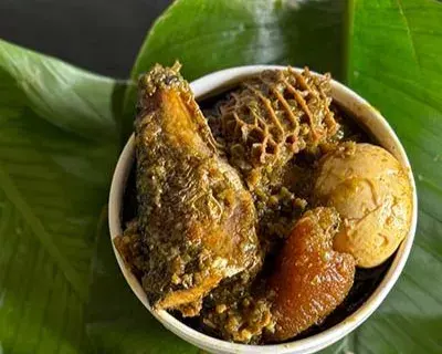 Ayamase, the Nigerian green pepper stew with assorted meat and boiled eggs