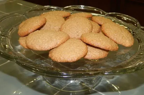 Benne cakes, thin crisp sesame seed cookies cooled on a rack