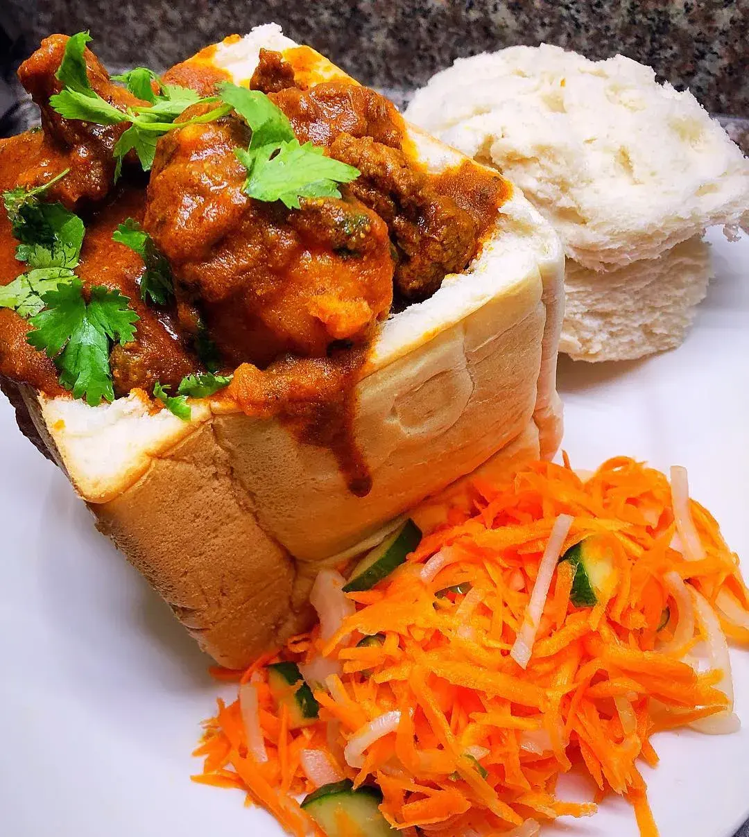 Bunny chow, a hollowed white loaf filled with Durban curry, chickpeas and potato