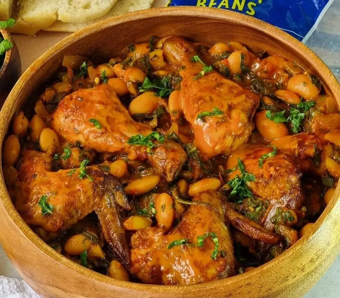 Cape Malay chicken curry with potatoes, whole spices and mango chutney, served with yellow rice
