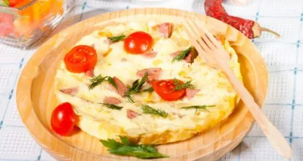 A cheese omelette, puffed and lightly browned
