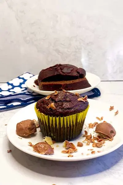 Chocolate muffins cooling on a rack