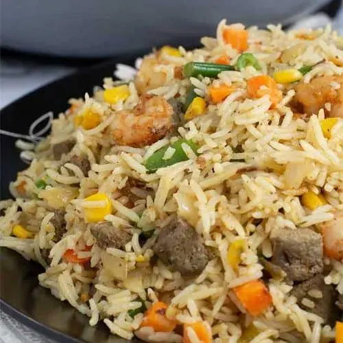 Coconut fried rice with mixed vegetables, cabbage and turmeric
