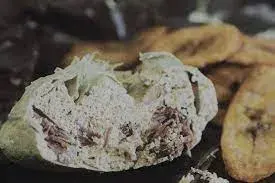 Egusi pudding, a steamed Nigerian savoury pudding of ground melon seeds