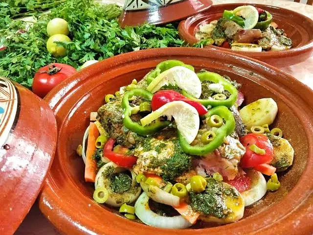 Fish fillets marinated in green chermoula and grilled