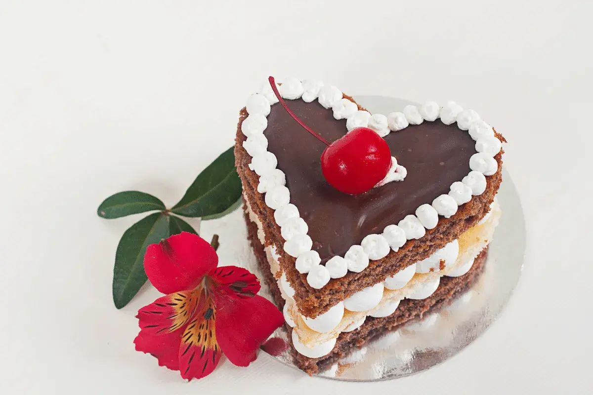 A heart-shaped chocolate layer cake with buttercream frosting