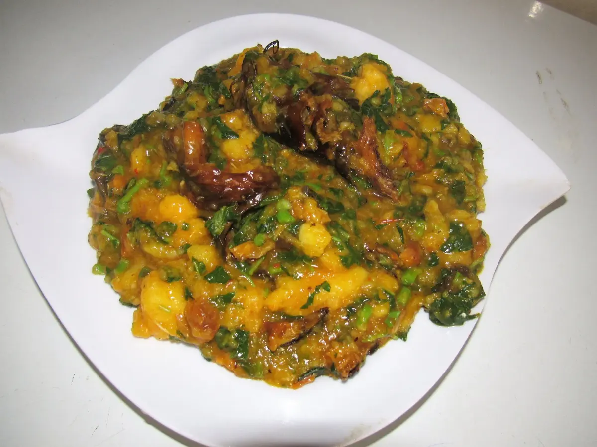 Ikokore, an Ijebu Nigerian pottage of grated water yam with palm oil, fish and meat