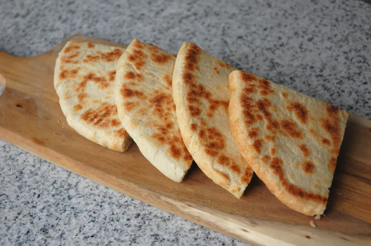 Kesra, a round Algerian flatbread cooked on a flat pan with ring markings