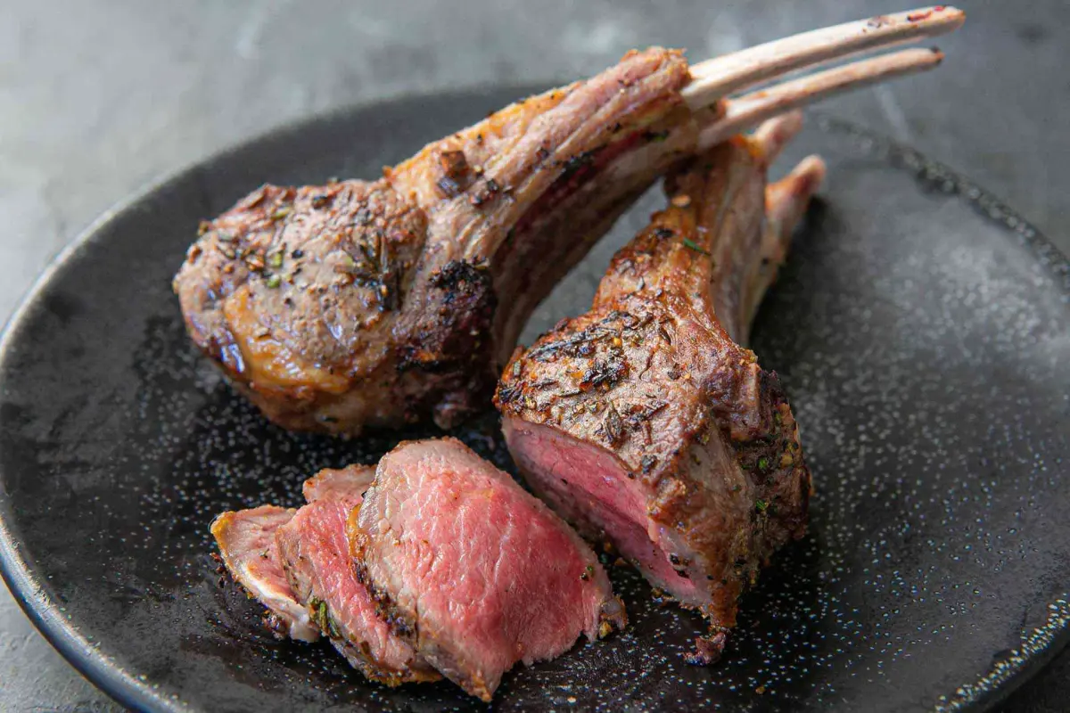 Lamb steaks rubbed with garlic and chilli, roasted on a rack