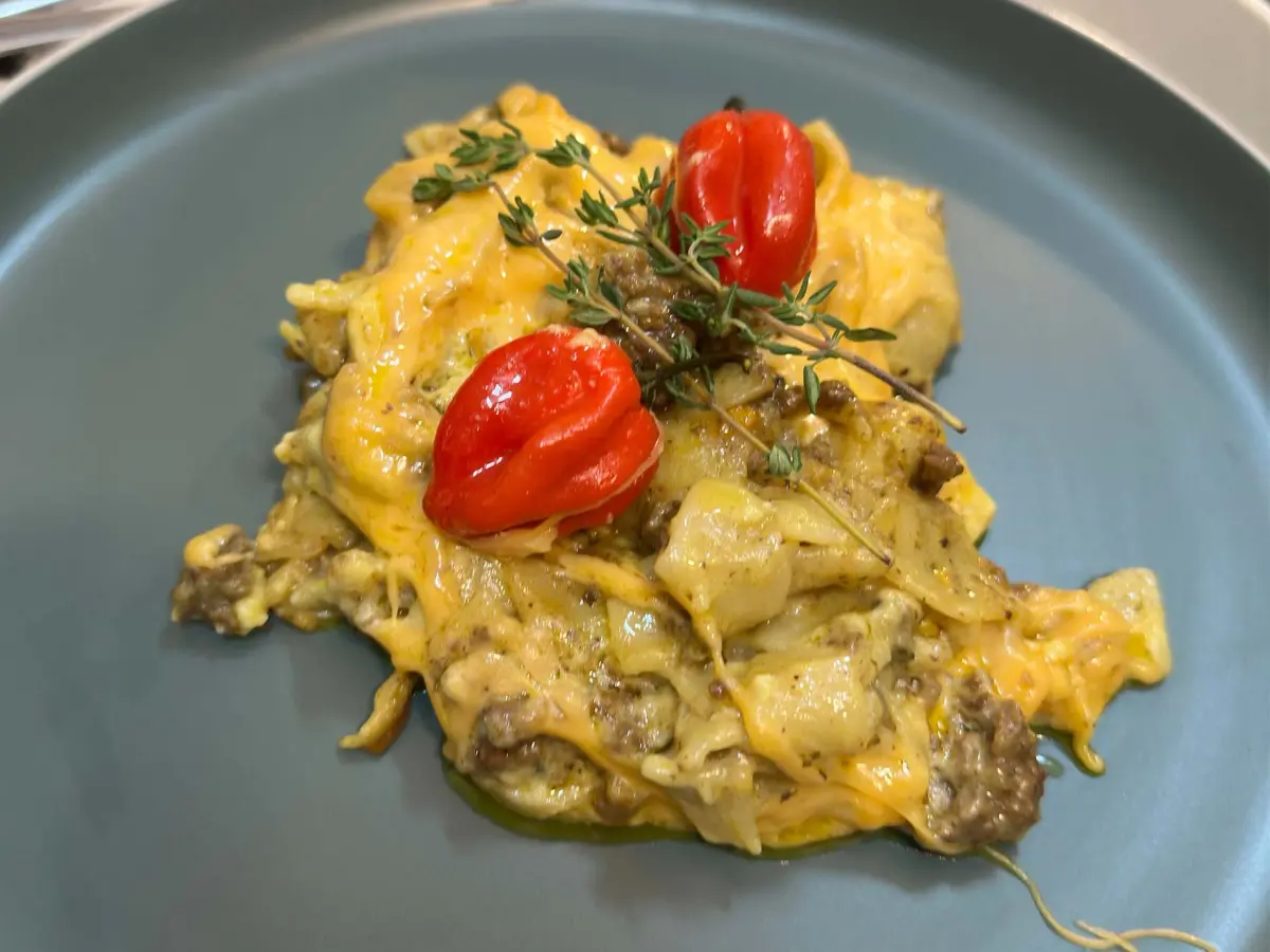 Mince and cheesy pasta bake topped with melted mozzarella and cheddar