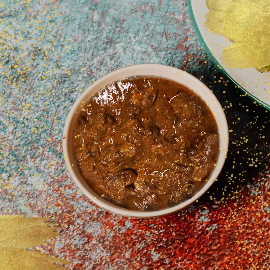 Namibian venison cooked in a spiced yoghurt curry with tomato and served with rice