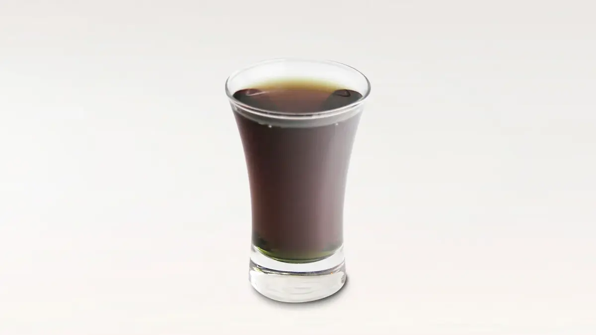 Homemade peppermint liqueur in a sealed bottle