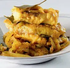 Cape Malay pickled fish layered under curried onion and vinegar sauce