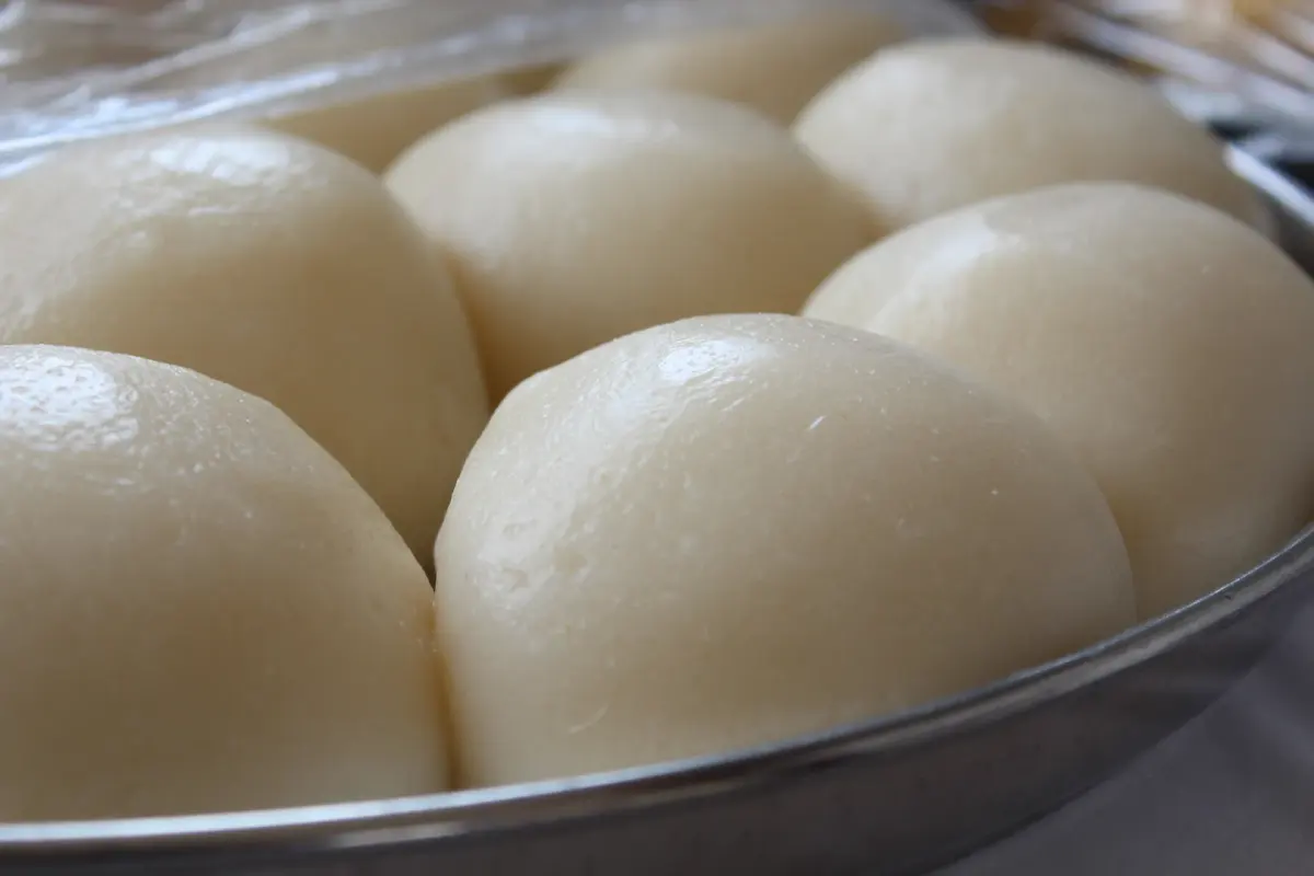 Smooth balls of placali in a metal tray