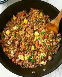 Pork fried rice with egg, bell pepper and mixed vegetables