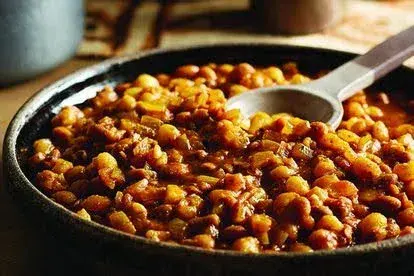 Samp and beans, the Xhosa dish umngqusho of broken maize and sugar beans with beef