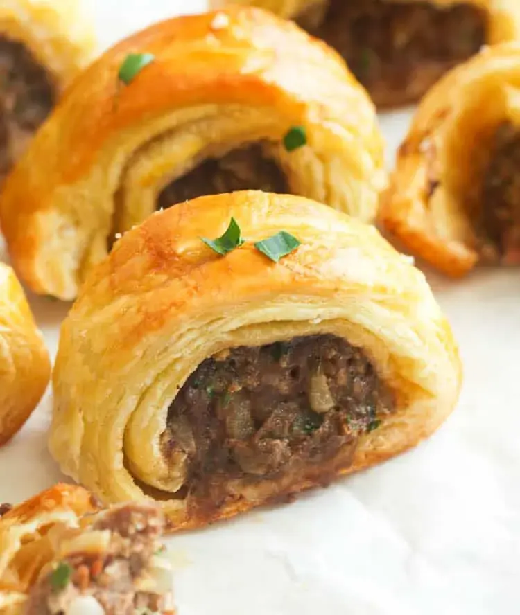 Nigerian sausage rolls, seasoned pork baked in a short pastry until golden