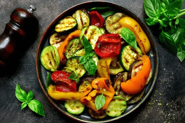 Smoked vegetables with courgette, peppers, asparagus and carrots seasoned with smoked paprika