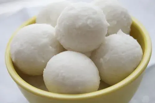 Tuwo shinkafa, smooth balls of Hausa rice swallow from northern Nigeria