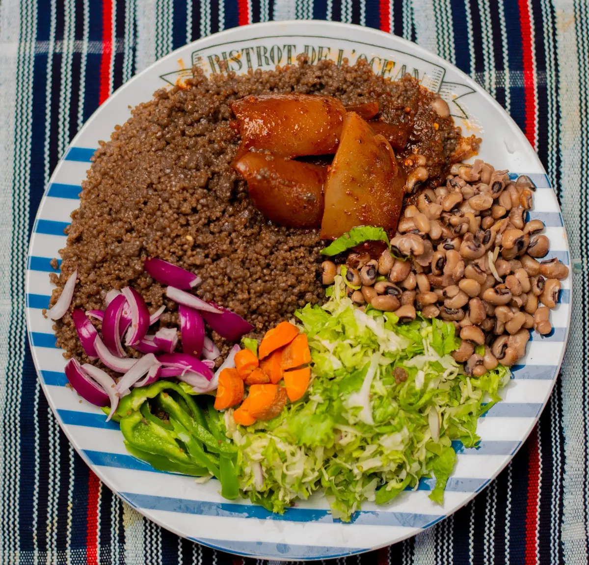 Wasawasa, a northern Ghanaian dish of steamed yam peel flour served with pepper sauce and fried fish