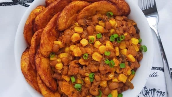 Adalu Nigerian beans and corn pottage in a pot, a traditional Yoruba one-pot meal from southwestern Nigeria