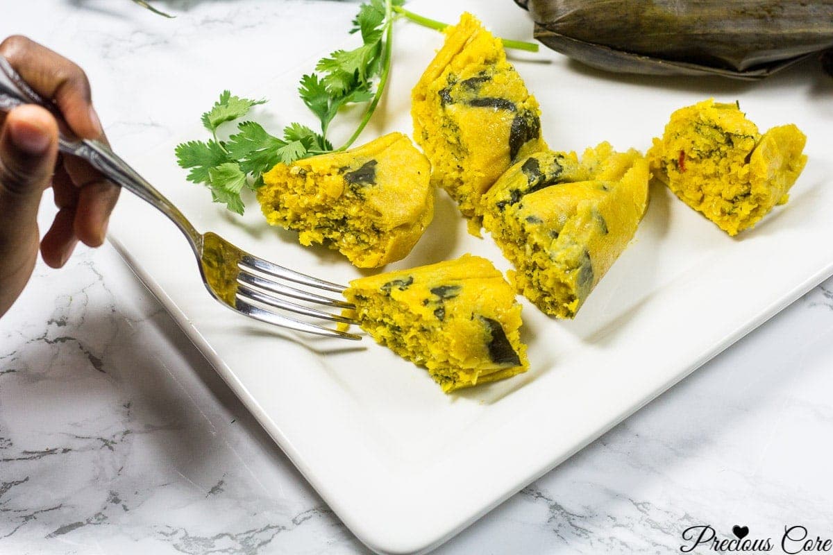 Cameroonian Koki Corn steamed corn pudding wrapped in banana leaves, a traditional Central African dish from Cameroon