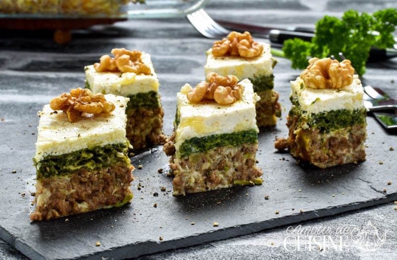 Tunisian Tajine el Bey baked egg and meat dish with cheese and parsley in a baking dish, a classic Tunisian oven preparation