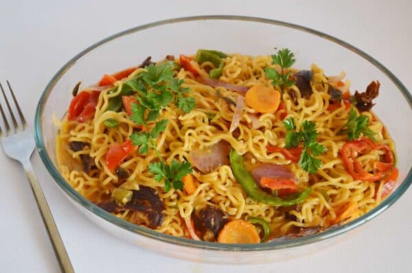 Kilishi Noodles Nigerian spiced dried beef noodles in a bowl, a fusion dish combining northern Nigerian kilishi with noodles