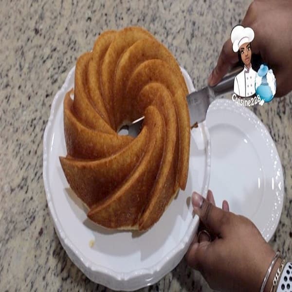 South African Rum Cake on a serving plate with a rich rum butter glaze, a moist celebration cake