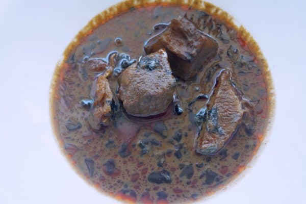 Abak Atama Soup served in a pot with assorted meat and fish, a traditional Ibibio palm nut soup from Akwa Ibom State, Nigeria