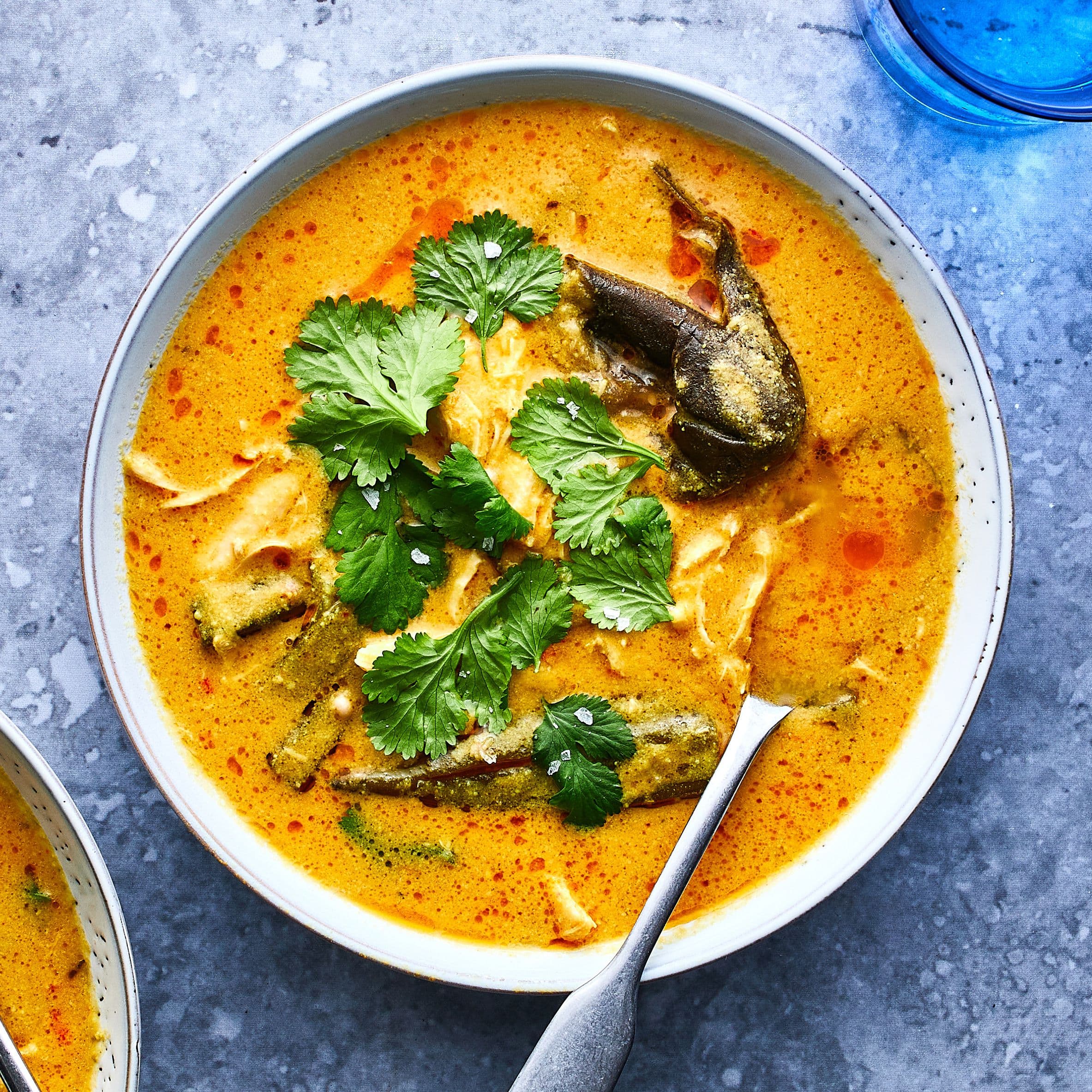 West African Peanut Butter Soup with chicken in a pot, a rich groundnut-based soup eaten across Ghana, Nigeria, and Cameroon