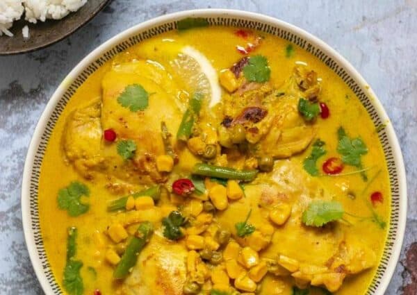 Kuku Paka Kenyan coconut chicken curry served with rice, a fragrant Swahili coast dish from Kenya
