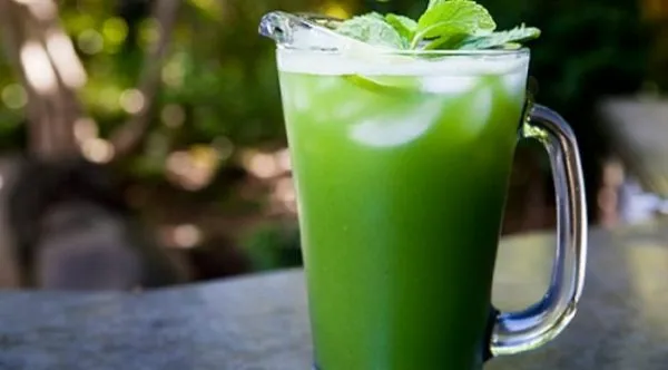 Cucumber mint agua fresca, a pale green chilled blended drink over ice