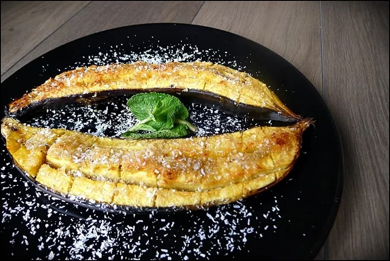Akwadu, baked bananas from Equatorial Guinea topped with toasted shredded coconut