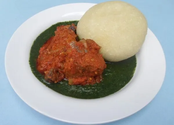 Amala lafun with ewedu soup, a Yoruba pairing of white cassava swallow and jute leaf soup
