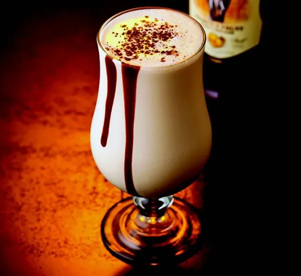 A homemade cream liqueur made with coffee, whiskey, condensed milk and cream, in a bottle
