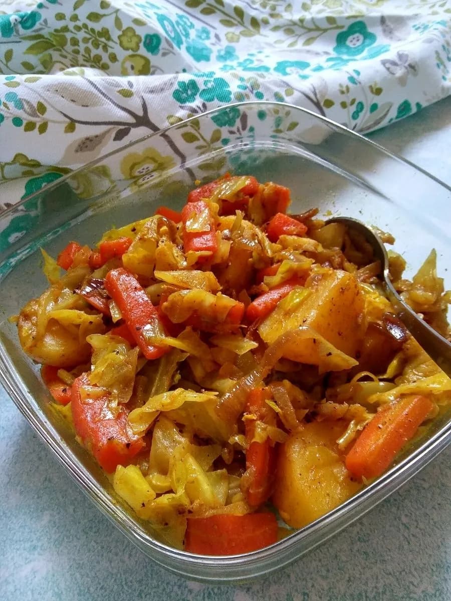 Atakilt wat, an Ethiopian stew of cabbage, carrot and potato with berbere spice, served with injera