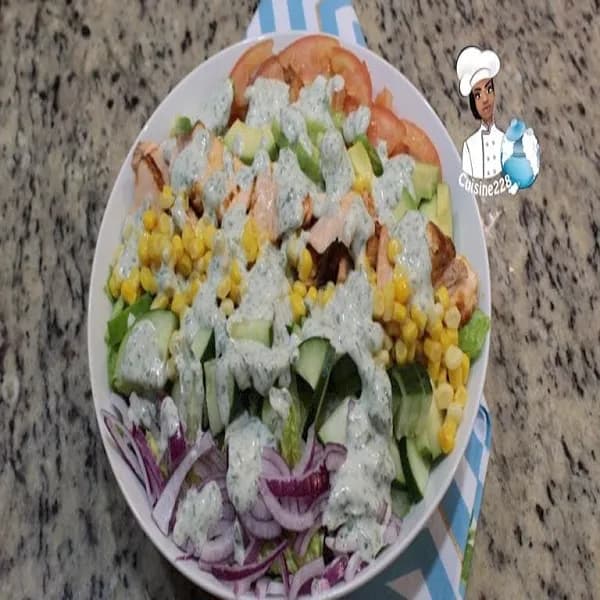 Avocado salmon salad with romaine, cucumber, tomato and red onion