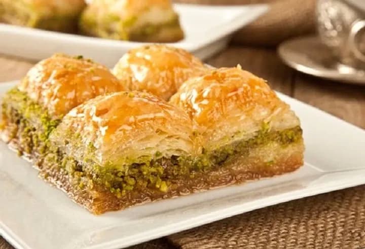 Baklawa, layered phyllo pastry with walnuts soaked in honey syrup and cut into diamonds