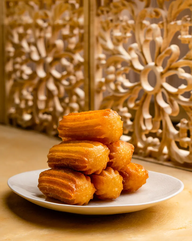 Balah el sham, ridged fried choux pastries soaked in sugar syrup