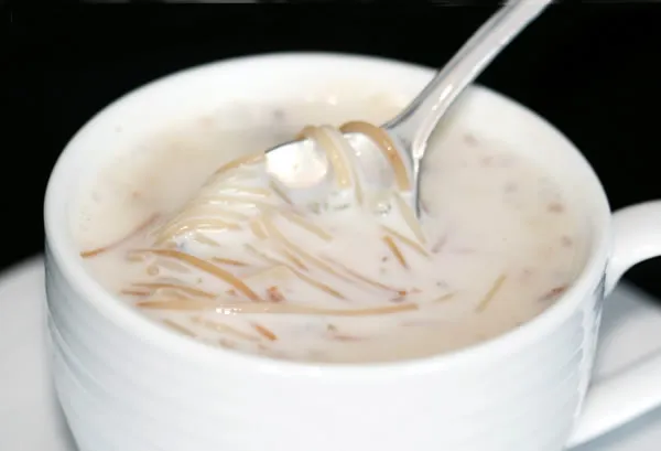 Boeber, a Cape Malay sweet milk drink from South Africa, served warm with slivered almonds
