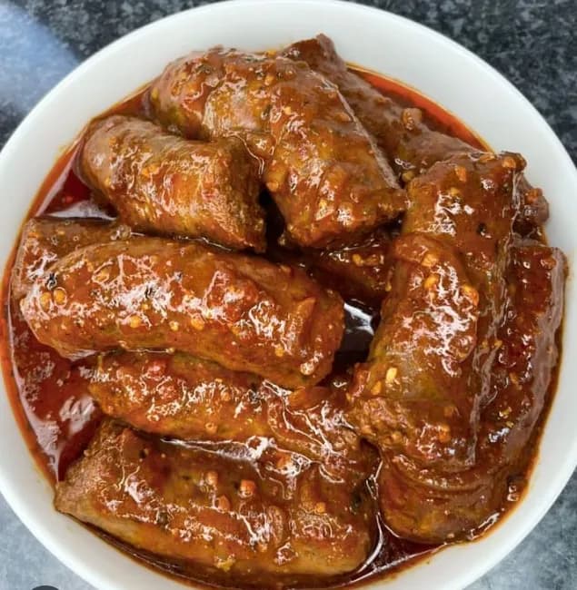 Chakalaka boerewors, South African coiled beef sausage cooked with spiced vegetable relish