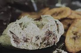 Egusi pudding, a steamed Nigerian savoury pudding of ground melon seeds