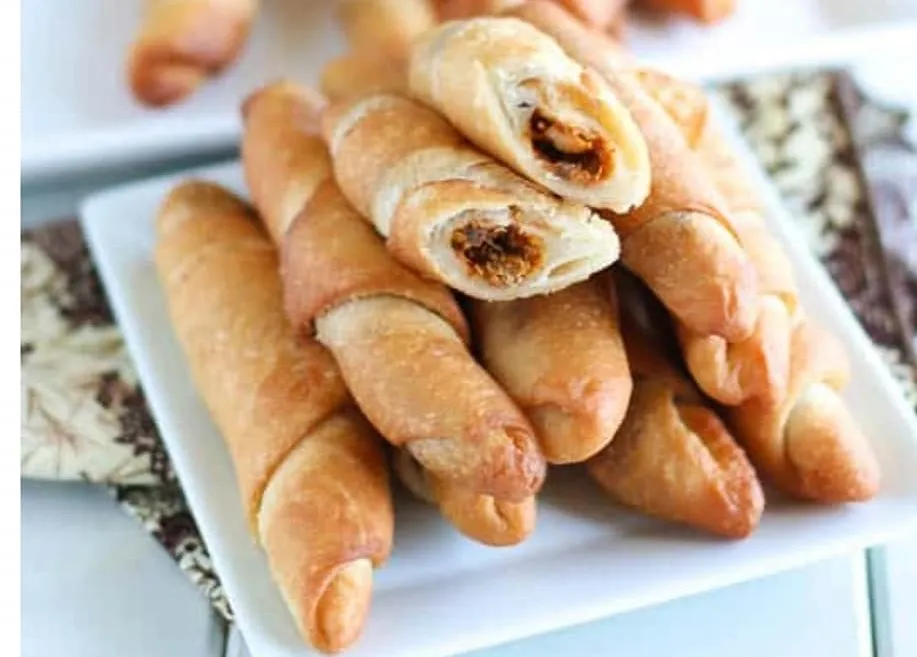 African fish rolls, crisp fried pastry rolls filled with seasoned flaked mackerel